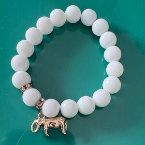 Elegant White Beaded Bracelet with Gold Elephant Charm
